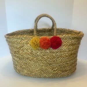 XL seagrass Tote with Colorful Pom Poms